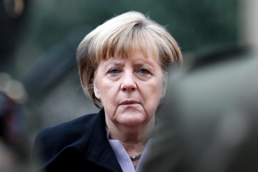 Angela Merkel foi lacónica na resposta às críticas e ameaças de Donald Trump